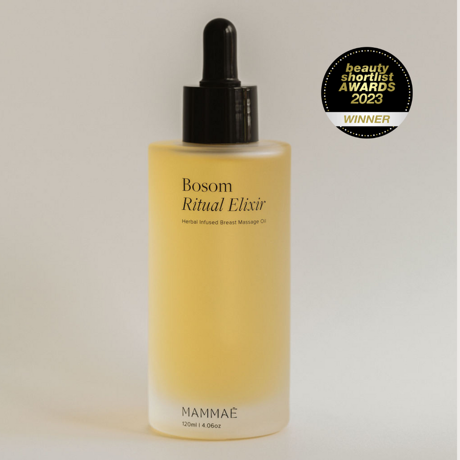 A bottle of Bosom Ritual™ Elixir by Mammae The Embodied Mother, perfect for lactation support and anytime a mama desires a nourishing skin-to-skin connection. Soothe and nourish with Bosom Ritual™ Elixir. Suitable for use as a belly oil, facial oil and whole body oil.