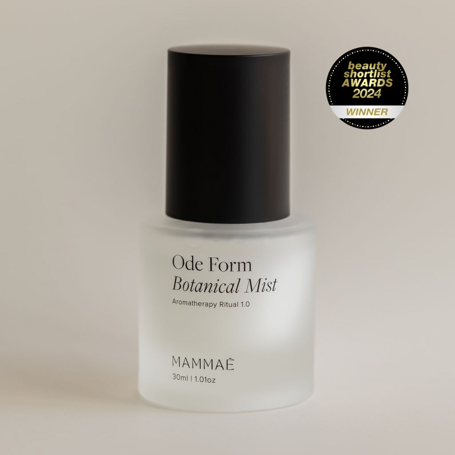 A bottle of Mini Ode Form™ Botanical Mist by Mammae The Embodied Mother with an award badge for beauty shortlist awards 2024.