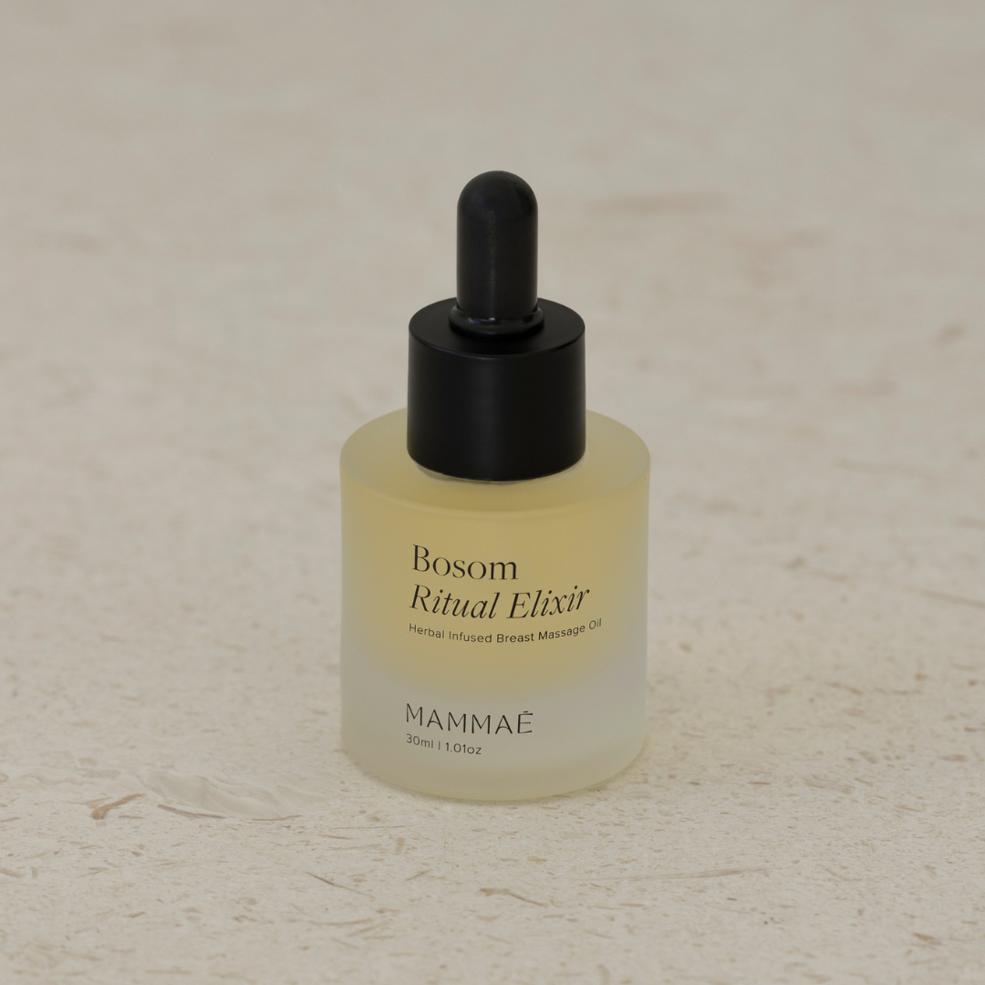 Mammae The Embodied Mother's Bosom Ritual™ Elixir 30ml Mini sitting on a stone table for breast health awareness and lactation health in breastfeeding and pumping mothers who need to increase low milk supply and support blocked milk ducts and mastitis. 