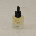 Mammae The Embodied Mother's Bosom Ritual™ Elixir 30ml Mini sitting on a stone table for breast health awareness and lactation health in breastfeeding and pumping mothers who need to increase low milk supply and support blocked milk ducts and mastitis. 