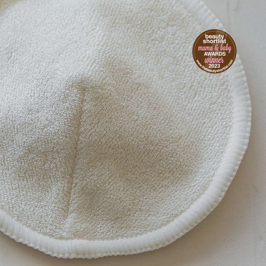 "Reusable nursing pads made of GOTS AND OEKO-TEX certified organic cotton and bamboo, designed to provide comfort and support for breastfeeding mothers."