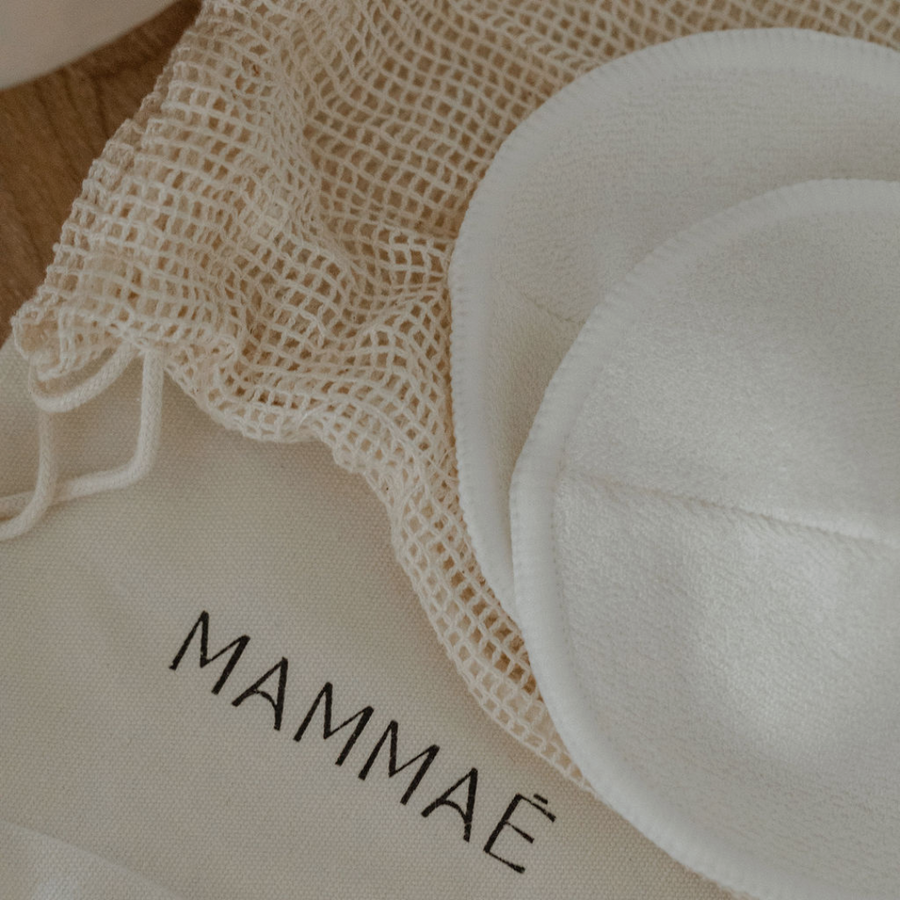 A white organic mesh wash bag for breastfeeding and breast care with the word Mammae The Embodied Mother on it: Bosom Wearables.