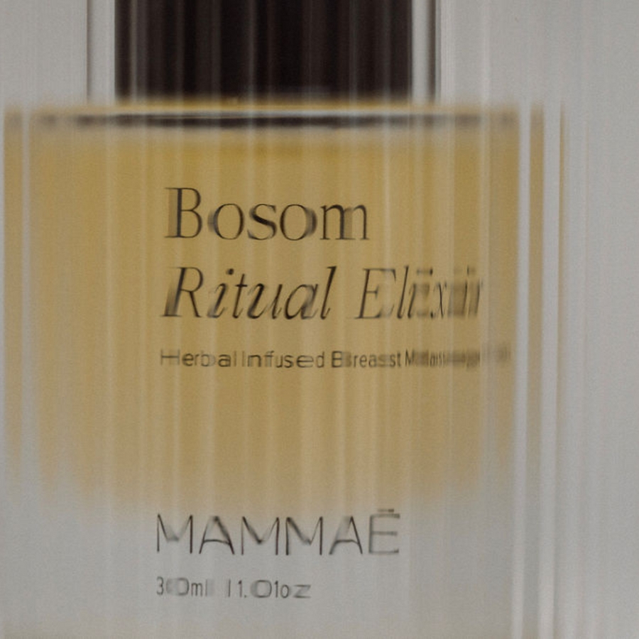 A bottle of Mini Bosom Ritual™ Elixir by Mammae The Embodied Mother on a white background.
