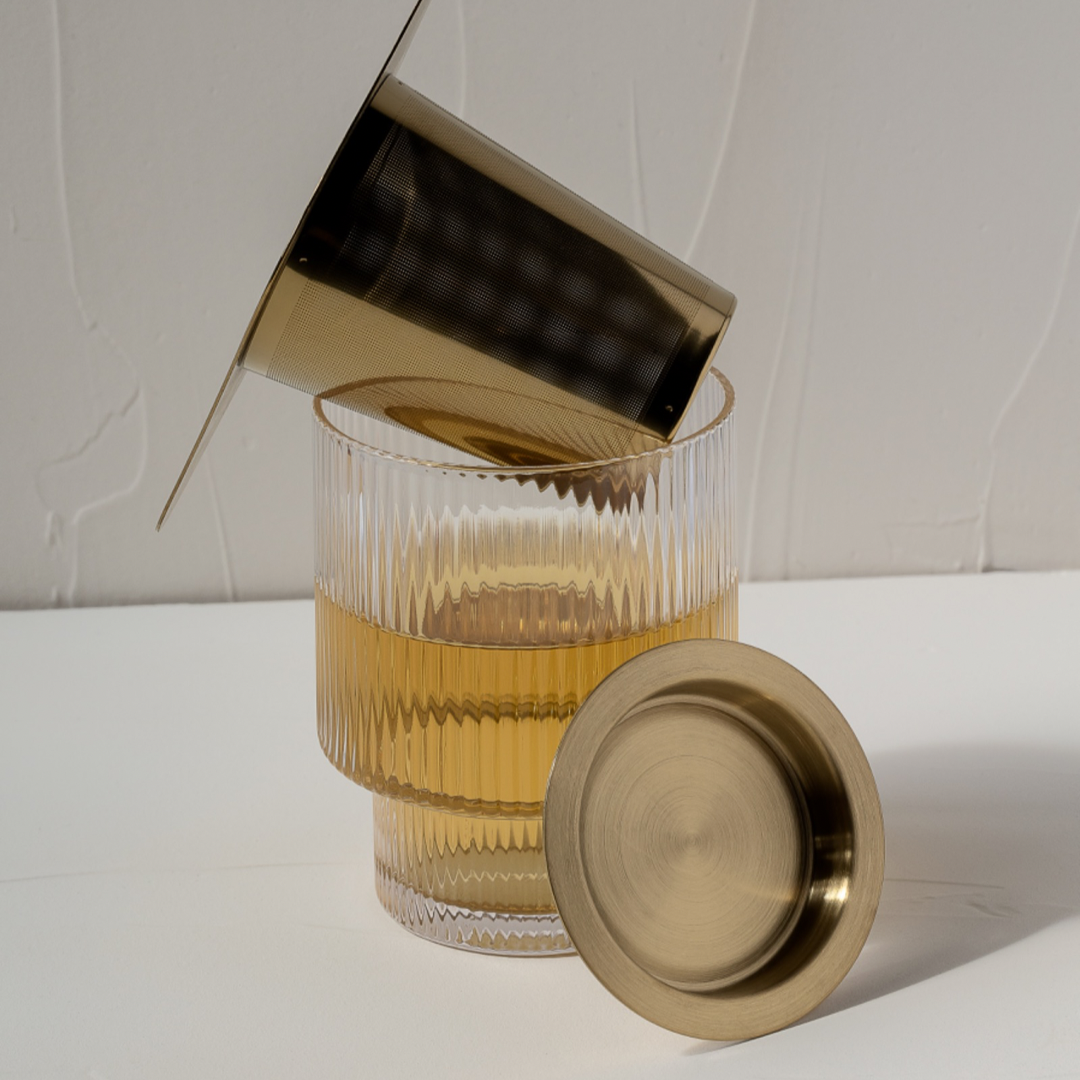 A Ritualware Tea Infuser for Nursing and Pregnancy, adorned with a lid.