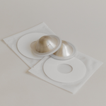 Mammae Silver Nipple Care bundle laid flat on a neutral backdrop. 